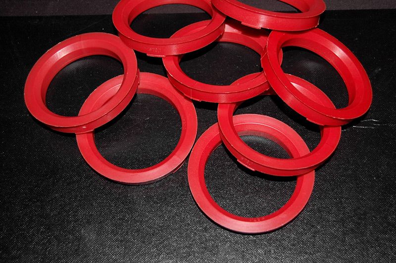 Example of plastic hub centric rings in the colour red